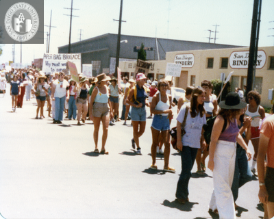 Marchers and "Paper bag brigade" banner at Pride parade, 1978