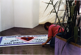 Meredith Vezina with Jess Jessop's quilt archives tent, 1990