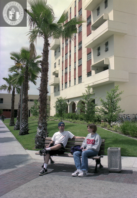 Students on a bench near Zura Hall, 1999