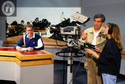 Film class with anchor desk and camera