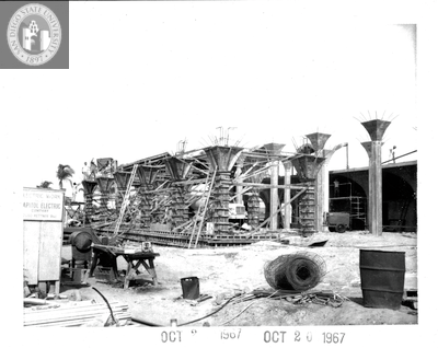 Pouring the last column, Aztec Center construction, 1967
