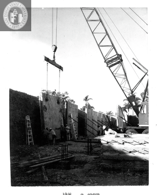 Walls placed at Aztec Center construction site, 1966