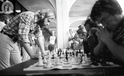 Students play chess outside Love Library, 1975