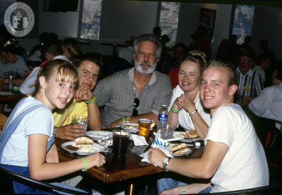Family at table during Family Weekend, 2000