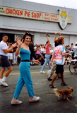 People and a dog in Pride parade, 1991