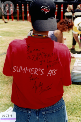 Pride staff member in "Summer's Ass" shirt at Pride event, 1999