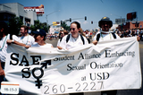 "Student Alliance Embracing Sexual Orientation (SAESO) at USD" banner at Pride parade, 1998