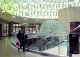 Student on ground floor of library dome, 1999
