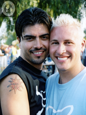 Two people cheek to cheek at the Pride Festival, 1998