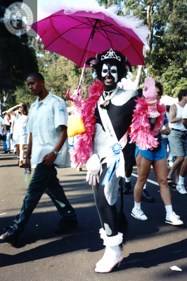 Costumed parade marcher Dairy Queen at Pride parade, 1996