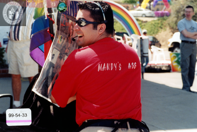 Volunteer with "Mandy's Ass" shirt at Pride event, 1999