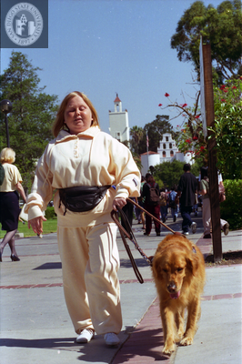 Woman with guide dog on Campanile Walkway, 2006