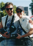 Jana Heder carrying a professional camera at San Diego Pride Festival, 1997