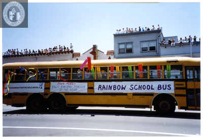 People in "Rainbow school bus" in Pride parade, 1999