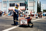 Clown selling "Horsie dodo" at Pride Parade, 1996