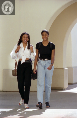 Students walk in front of Student Services West, 1996