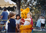 Children with Winnie the Pooh at For the Children, 1996