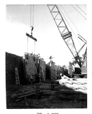 Walls placed at Aztec Center construction site, 1966