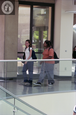 Students on main floor of library dome, 1996