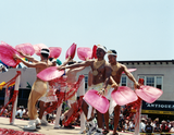 Men in costume on float at Pride parade, 1998