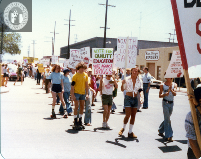 Marchers holding signs at Pride parade, 1978