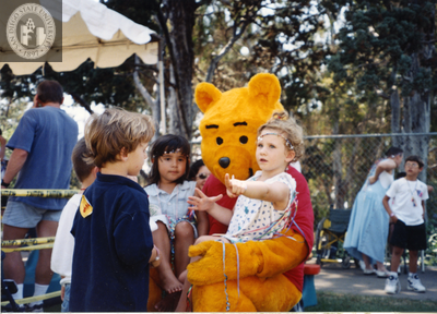 Children with Winnie the Pooh at For the Children, 1996