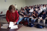 Instructor and students in lecture hall, 1996