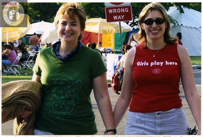 Two women holding hands at Pride festival, 2006