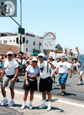 PFLAG marchers holding "We Love Our Gay Son" sign at Pride parade, 1998