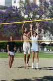 Students playing volleyball, 1996