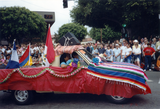 Car decorated with Latin American flags in Pride parade, 1991