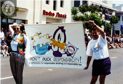 "Don't Duck Responsibility!" banner in San Diego Pride parade, 1994