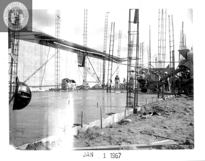 Fresh cement, Aztec Center construction site, 1967