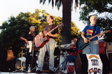 Young performers with guitars at Youth Stage and Open Mic, 1999