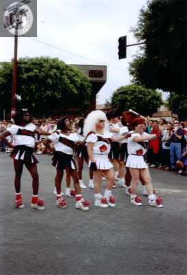Male cheerleaders in drag in Pride parade, 1991