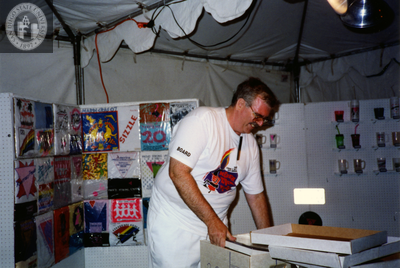 Doug Moore sets up Lesbian and Gay Historical Society tent, 1994