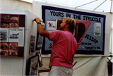 Setting up Lesbian and Gay Archives display tent at Pride festival, 1990