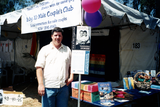 "In by 10: Male Couple's Club" booth at Pride Festival, 1998