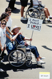 "I Don't Protest...I Love!" sign at Pride parade, 1997