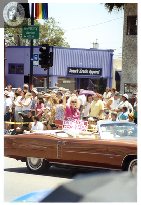 Senator Dede Alpert in the back of a convertible in Pride parade, 1998