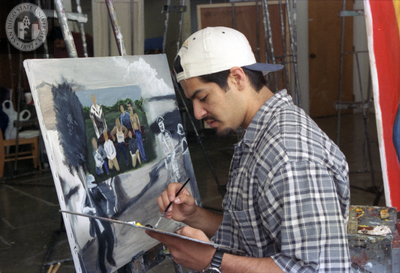 Student painter with his painting and palette, 1996