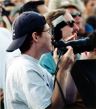 Person taking photographs at Pride Festival, 1997