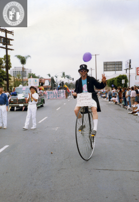 Albert Bell on a penny farthing bicycle in the San Diego Pride Parade, 1989