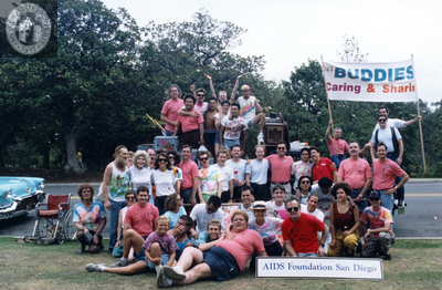 AIDS Foundation San Diego group portrait with Pride Parade float, 1991