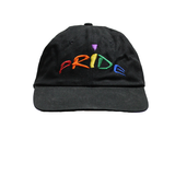 "PRIDE" on a baseball cap in five colors of the rainbow