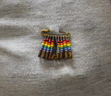 Safety pins with rainbow beads