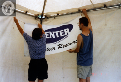 Volunteers setting up Center tent at Pride festival, 1998