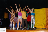 Performers posing as a group onstage at Spirit of Stonewall Rally, 2000