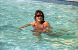 Student in campus swimming pool, 1996