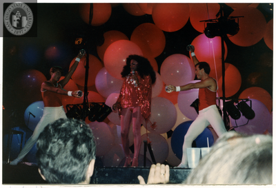 Performer onstage with two others at Summer Heat at Sports Arena, 1982